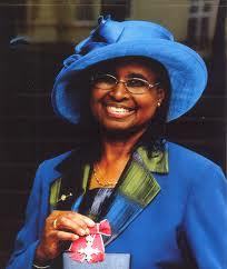 Louise Da-Cocodia in 2005 with her MBE for services to the people of Manchester.
